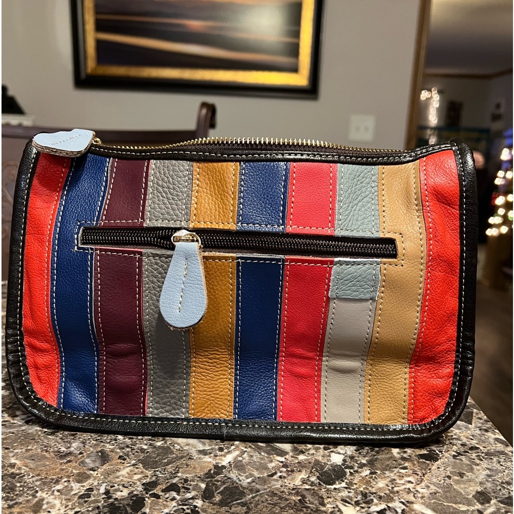 Leather clutch with strap. New, never used